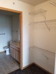 Ashbury Residential Suites walk in closet and bathroom