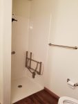 Town Square Residential Suites bathroom handicap shower with bench
